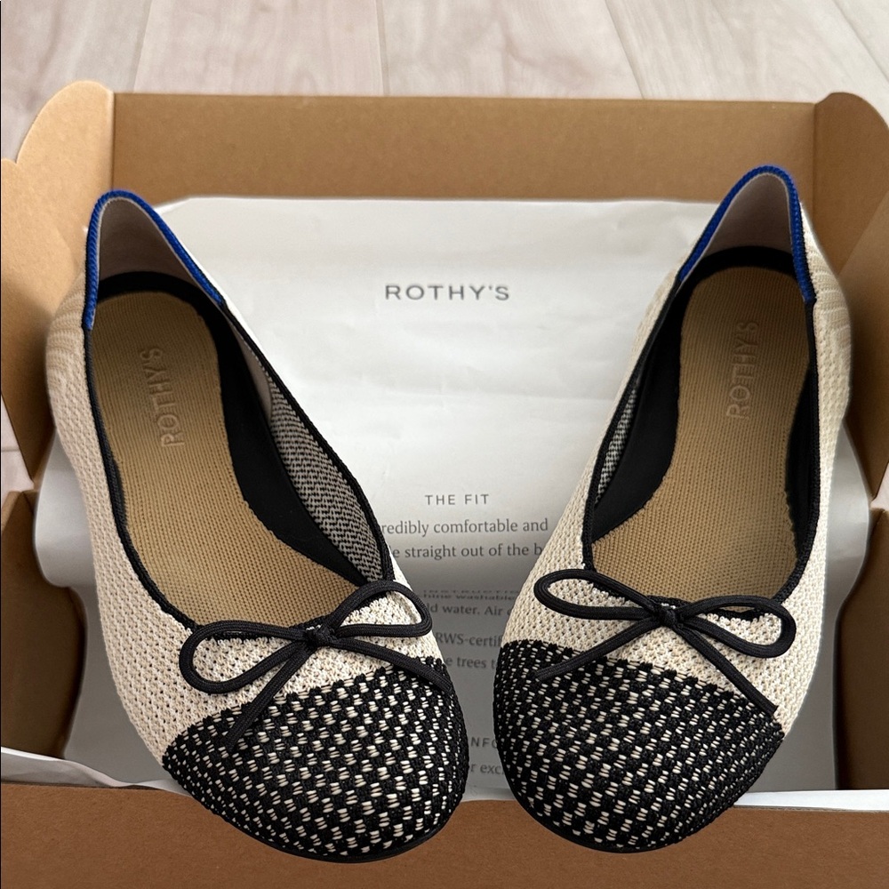 Rothy's Black and White Flats with Blue Trim